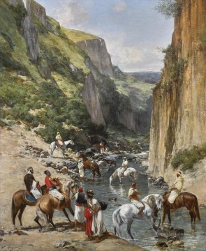 アラブ Painting - 渓谷のライダー ヴィクトル・ユゲ・アラベール